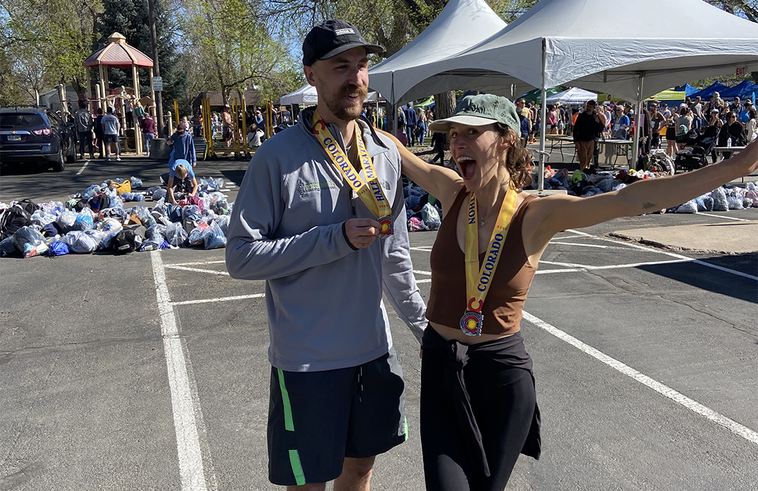 Two DARE Students celebrate at the end of a running race