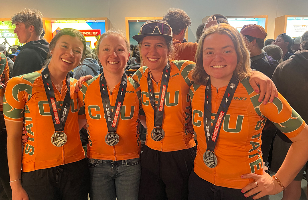 Four DARE students pose for a photo after a bike race