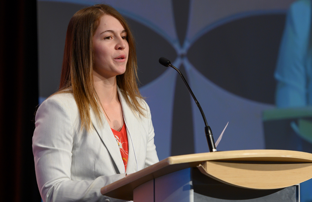 student speaking at podium