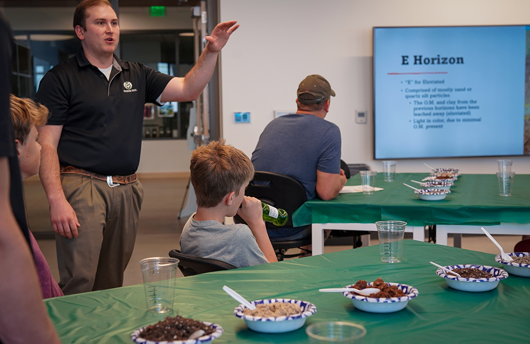 teacher instructing course on soils for kids