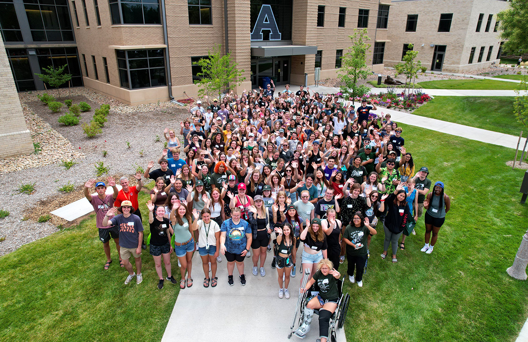 Aerial image of a group of people waving