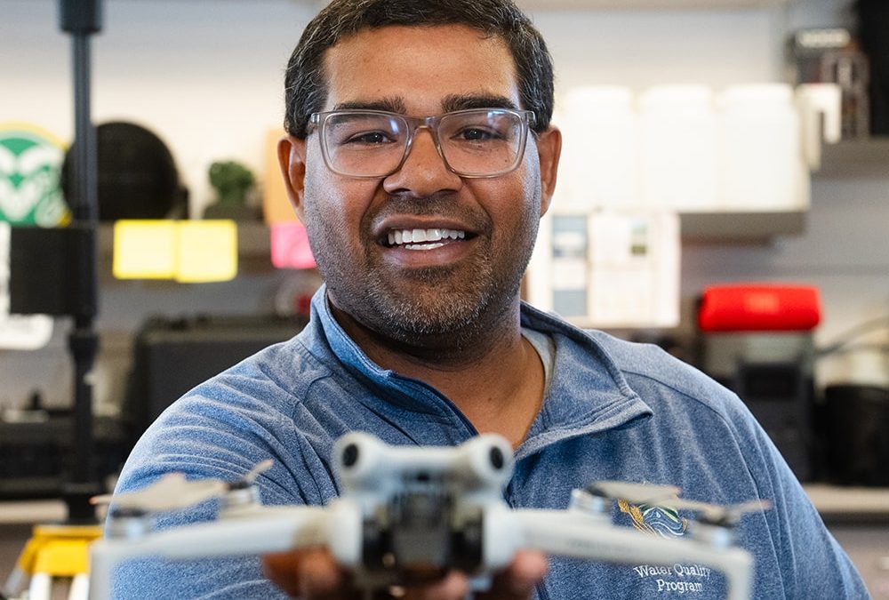 Manny Deleon holding a drone